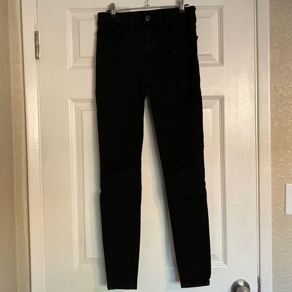 Distressed High Rise Jegging